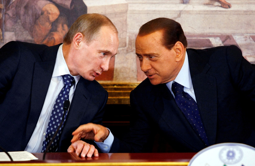  Italian Prime Minister Silvio Berlusconi talks with Russian Prime Minister Vladimir Putin during a news conference during a summit at Villa Gernetto in Gerno, Italy, April 26, 2010 (photo credit: Reuters/Alessandro Garofalo/File Photo)