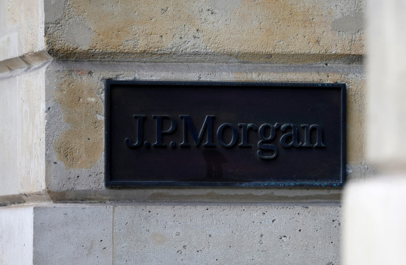   J.P. Morgan logo is seen outside the JPMorgan bank offices in Paris, France, January 27, 2023 (photo credit: REUTERS/SARAH MEYSSONNIER/FILE PHOTO)