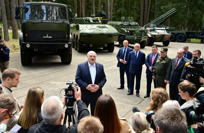  Belarusian President Alexander Lukashenko speaks to journalists during his visit to a military-industrial complex facility in the Minsk Region, Belarus June 13, 2023. (photo credit: Press Service of the President of the Republic of Belarus/Handout via REUTERS)