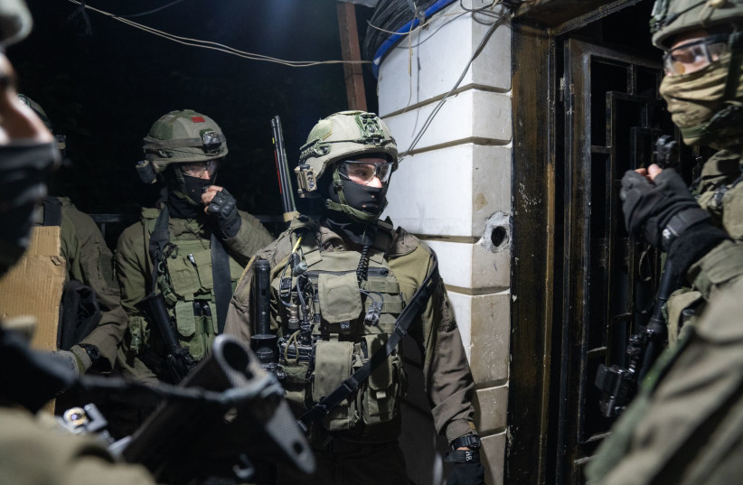  IDF soldiers demolish the home of terrorist Osama Tawil in Nablus. (photo credit: IDF SPOKESPERSON'S UNIT)