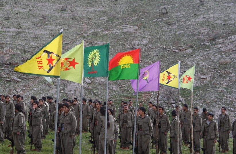  PJAK FIGHTERS take part in a ceremony, Qandil Mountains, 2022. (photo credit: PJAK)