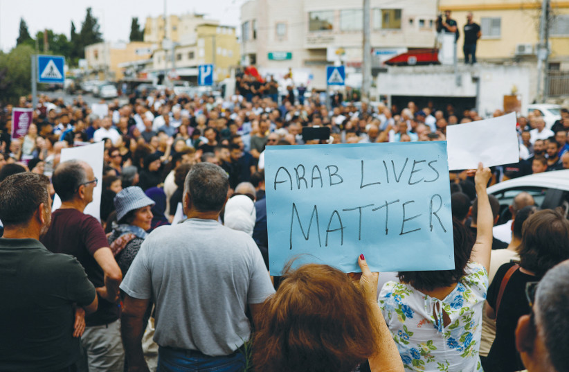  A PROTEST against rampant violence in the Arab sector takes place following shooting attacks, in Nazareth, last week.  (photo credit: AMMAR AWAD/REUTERS)