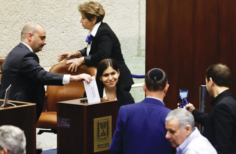  MK KARINE ELHARRAR poses for a picture after voting in the Judicial Selection Committee vote earlier this week. (photo credit: MARC ISRAEL SELLEM/THE JERUSALEM POST)
