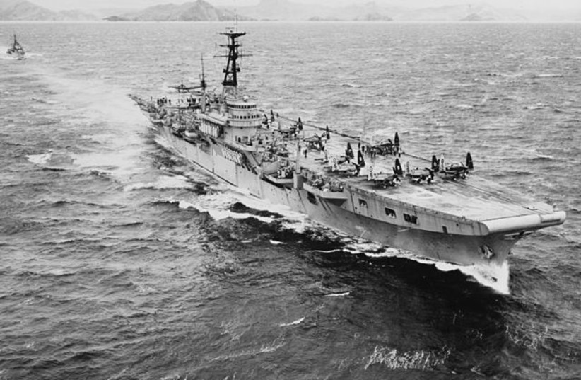  The Royal Navy aircraft carrier HMS Triumph (16) underway off Subic Bay, Philippines, during exercises, 8 March 1950. (photo credit: Wikimedia Commons)