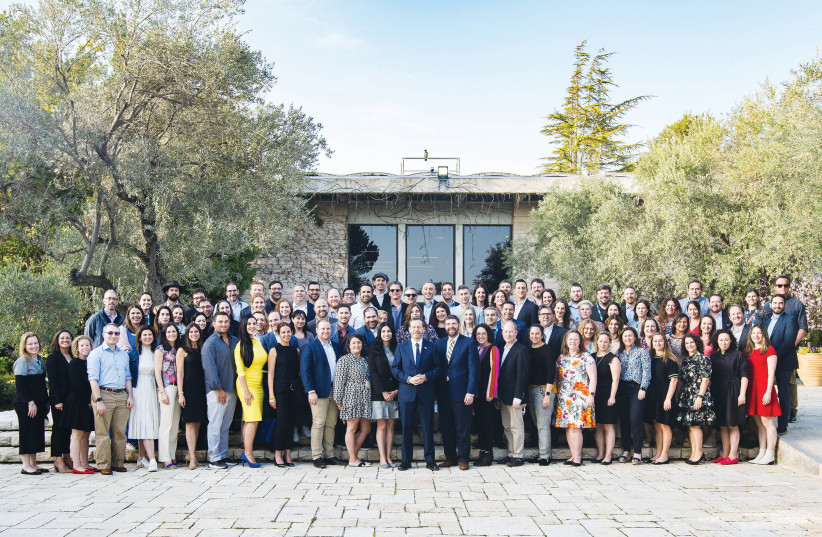  MEMBERS OF Jewish Federations of North America’s National Young Leadership Cabinet pose with President Isaac Herzog during the 2022 International Study Mission in Israel.  (photo credit: Yehoshua Deston)