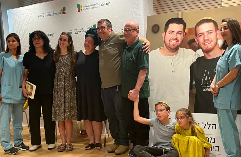  Yaniv family with recipients and medical team who performed cornea transplants (photo credit: TAMAR COHEN)
