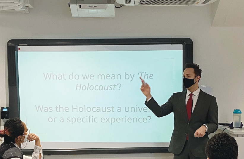  THE WRITER teaches the Holocaust at The Harbour School, Hong Kong (photo credit: Joanna Mok)