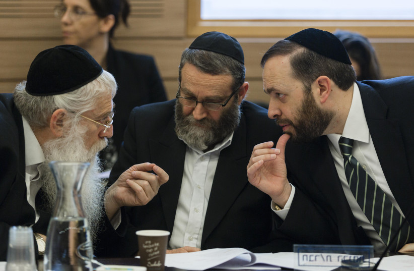  Ultra-Orthodox UTJ MKs Meir Porush (L), Moshe Gafni and Ariel Atias (R) seen in the Knesset on February 18 (photo credit: FLASH90)