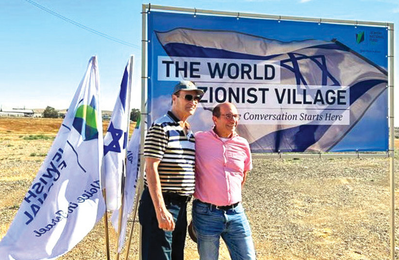  ISRAELI BASKETBALL legend Tal Brody (left) and the writer imagine turning this wasteland into a World Zionist Village.  (photo credit: JNF-USA)
