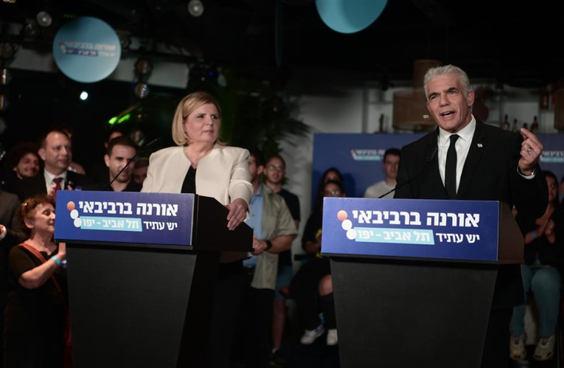  Yesh Atid MKs Orna Barbivay and Yair Lapid announce the former's run for mayor of Tel Aviv on June 21, 2023 (photo credit: AVSHALOM SASSONI/MAARIV)