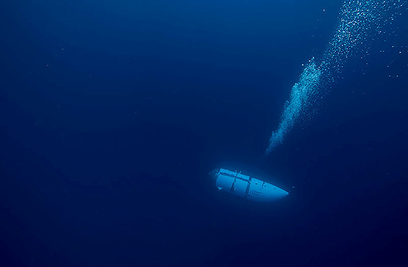 The Titan submersible, operated by OceanGate Expeditions to explore the wreckage of the sunken SS Titanic off the coast of Newfoundland, dives in an undated photograph (photo credit: OceanGate Expeditions/Handout via REUTERS)