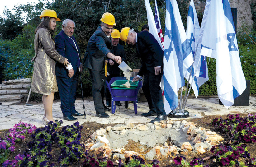  THE CORNERSTONE is laid for the Albert Einstein museum (from L): Maria and Jose Mugrabi, Yishai Fraenkel, Hebrew University vice president and director-general; and Hebrew University president Prof. Asher Cohen. (photo credit: Maxim Dinstein)
