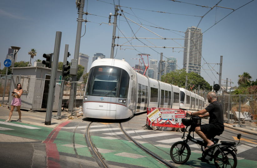Trial runs of the new Metropolitan Light Rail in Tel Aviv-Jaffa. The Light Rail will run through Tel Aviv and surrounding central cities. June 6, 2023. (photo credit: MIRIAM ALSTER/FLASH90)