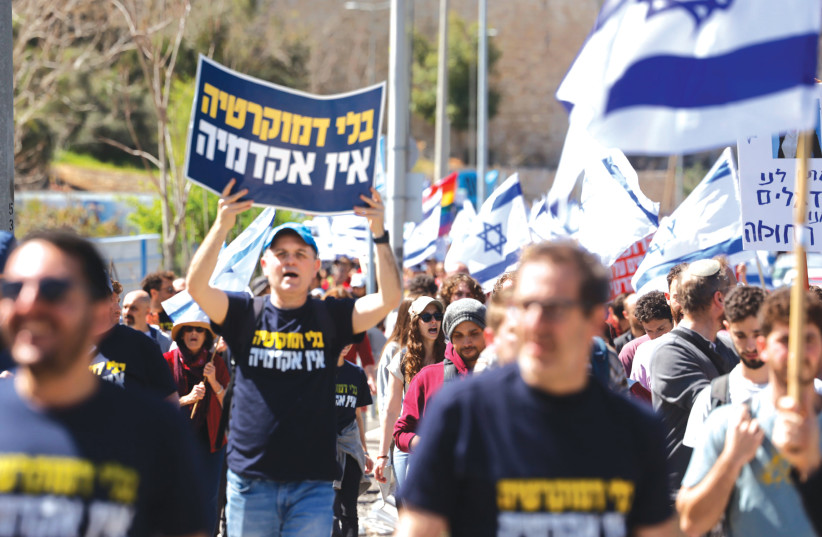  HEBREW UNIVERSITY students in Jerusalem’s Givat Ram neighborhood protest the proposed judicial reform, in March.  (photo credit: MARC ISRAEL SELLEM/THE JERUSALEM POST)