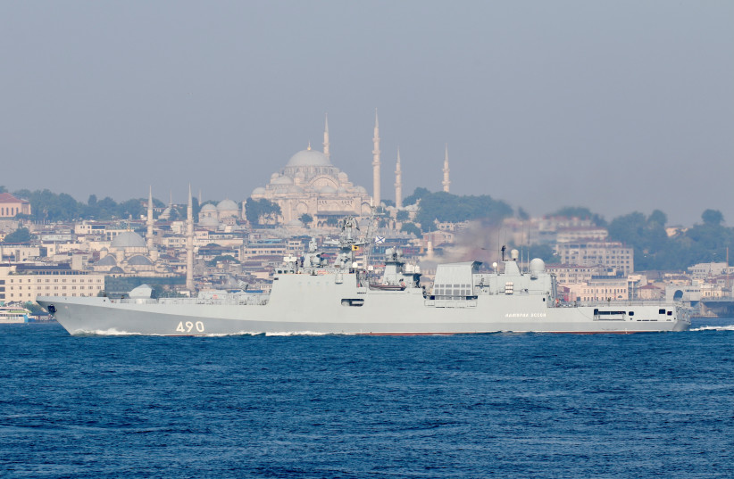 The Russian Navy's frigate Admiral Essen sets sail in the Bosphorus, on its way to the Mediterranean Sea, in Istanbul, Turkey June 18, 2021.  (photo credit: YORUK ISIK/ REUTERS)