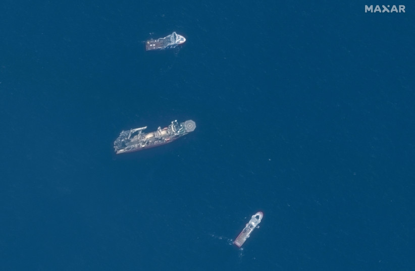  A satellite image shows ships taking part in the search and rescue operations associated with the missing Titan submersible near the wreck of the Titanic, June 22, 2023 (photo credit: MAXAR TECHNOLOGIES/HANDOUT VIA REUTERS)