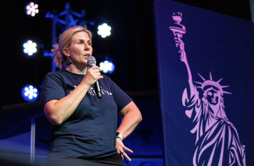  Robin Steenman, chair of the local chapter of Moms for Liberty, leads the group's chapter meeting at Generations Church, in Franklin, Tennessee, U.S., August 17, 2021. (photo credit: REUTERS/EVELYN HOCKSTEIN)