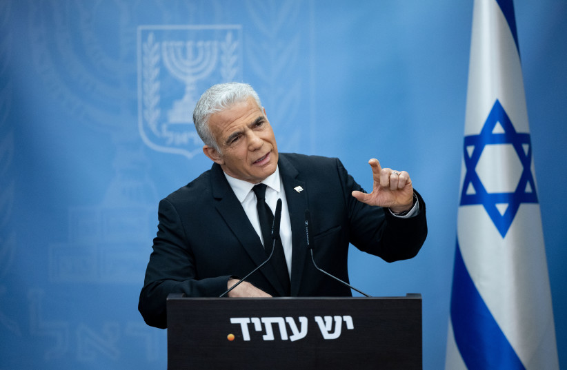  Head of the Yesh Atid party MK Yair Lapid speaks during a faction meeting at the Knesset, the Israeli parliament in Jerusalem, on June 19, 2023. (photo credit: YONATAN SINDEL/FLASH90)