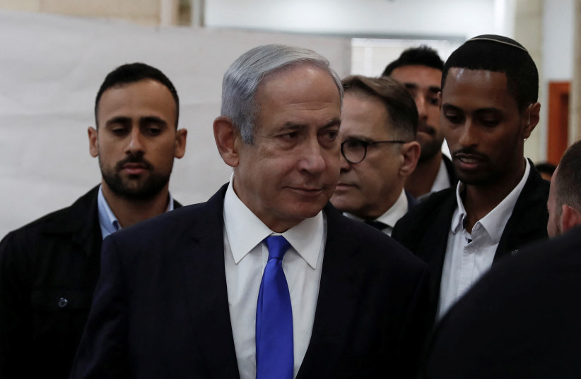  Israeli Prime Minister Benjamin Netanyahu attends Arnon Milchan's video testimony, during Netanyahu's ongoing trial at the District Court in Jerusalem, June 25, 2023. (photo credit: ATEF SAFADI/POOL VIA REUTERS)