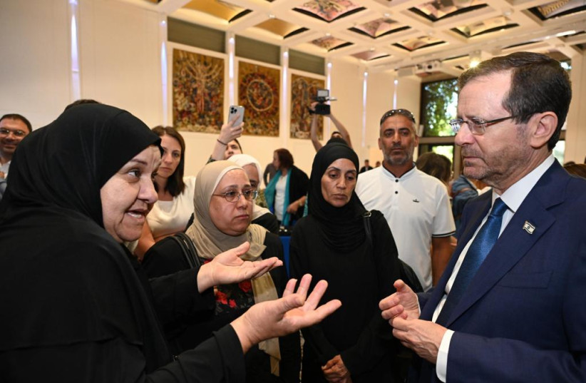  Israeli President Isaac Herzog is seen meeting with Arab women at the President's Residence in Jerusalem, on June 25, 2023. (photo credit: HAIM ZACH/GPO)