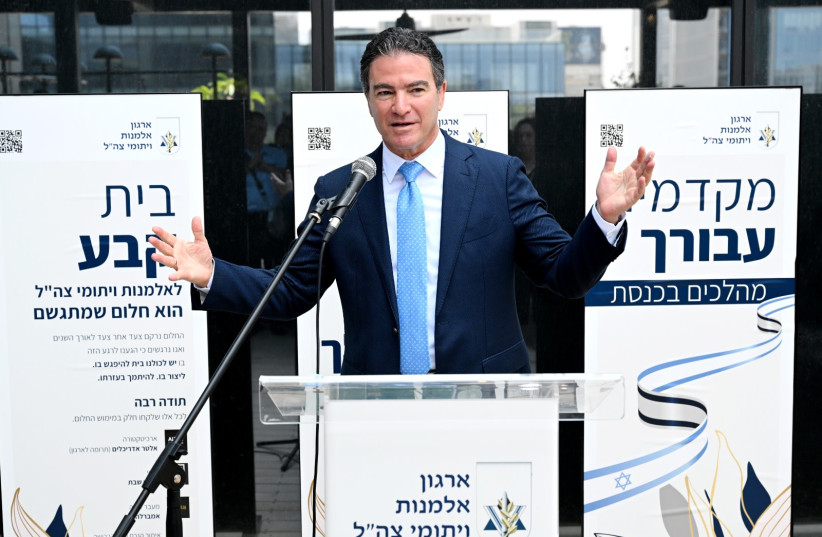 Former Mossad chief Yossi Cohen speaks at the IDF Widows and Orphans new headquarters' opening, June 24, 2023. (photo credit: KOBI KONAKS)