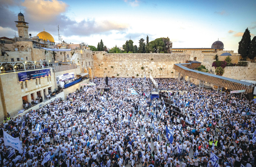  THE MASSES gather at the Western Wall on Jerusalem Day, last month. This is the Jewish homeland, not the new Denmark, or the 51st US state, says the writer.  (photo credit: YONATAN SINDEL/FLASH90)