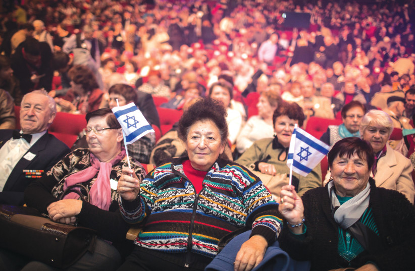 Olim attend an event marking 25 years of the great aliyah from the former Soviet Union,  in Jerusalem in 2015. Do we no longer have the resolve to save Jews? (photo credit: HADAS PARUSH/FLASH90)