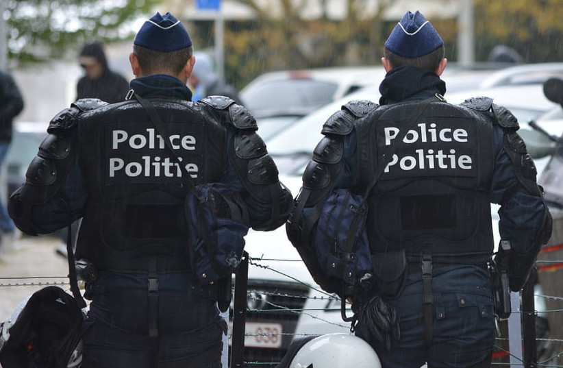  Police officers wearing body armor (photo credit: PXFUEL)
