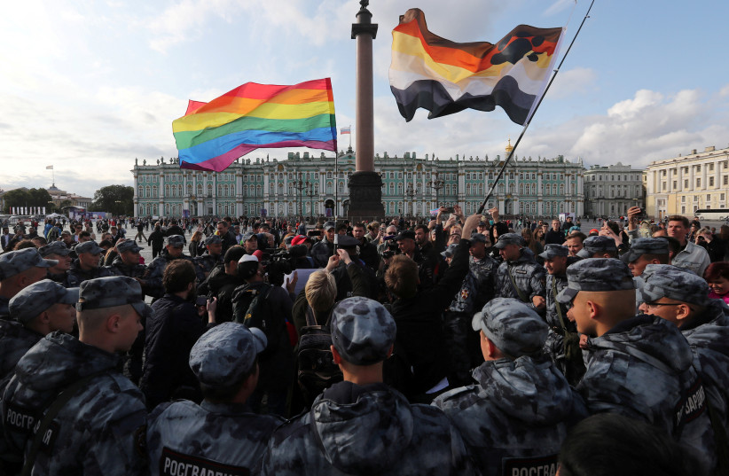  Law enforcement officers block participants of the LGBT community rally "X St.Petersburg Pride" in central Saint Petersburg, Russia August 3, 2019 (photo credit: REUTERS/ANTON VAGANOV)