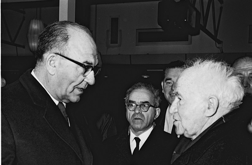  Then-prime minister Levy Eshkol bids David Ben-Gurion farewell at the airport on January 29, 1965, on his way to attend Winston Churchill’s funeral in London. (photo credit: FRITZ COHEN/GPO)