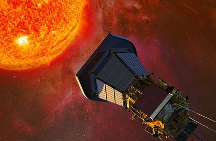  The Solar Probe Plus spacecraft with solar panels folded into the shadows of its protective shield, gathers data on its approach to the Sun (photo credit: NASA)