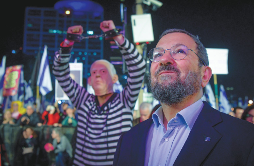  FORMER PRIME minister Ehud Barak participates in a protest against the government’s planned judicial reform in February.  (photo credit: AVSHALOM SASSONI/FLASH90)