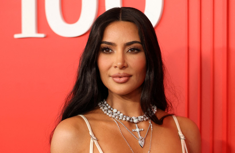  Kim Kardashian poses on the red carpet as she arrives for the Time Magazine 100 gala celebrating their list of the 100 Most Influential People in the world in New York City, New York, US, April 26, 2023. (photo credit: REUTERS/ANDREW KELLY/FILE PHOTO)