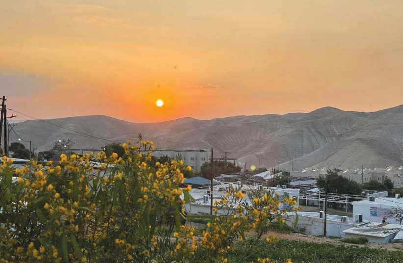  THE SUN sets over Mitzpe Yericho, as seen from the center of the community. (photo credit: Uri Pilichowski)