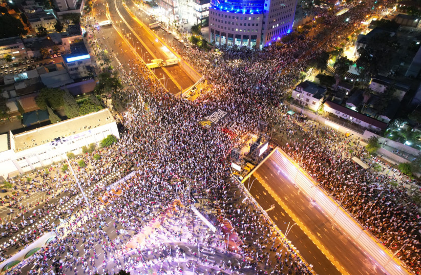 Israeli protesters are seen on Tel Aviv's Kaplan Interchange on July 1, 2023 (photo credit: GILAD FURST)