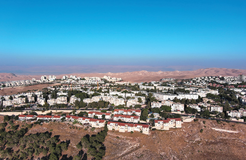  AN AERIAL view of Ma’aleh Adumim: Besides rooting Israel’s historical connection to this land, the term ‘Judea and Samaria’ was in use throughout the period of the British Mandate. (photo credit: ILAN ROSENBERG/REUTERS)