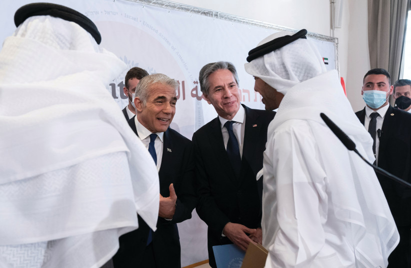  THEN-FOREIGN Minister Yair Lapid and US Secretary of State Antony Blinken chat with the foreign ministers of the UAE and Bahrain after a meeting of the Negev Summit in Sde Boker, last year.  (photo credit: Jacquelyn Martin/Reuters)