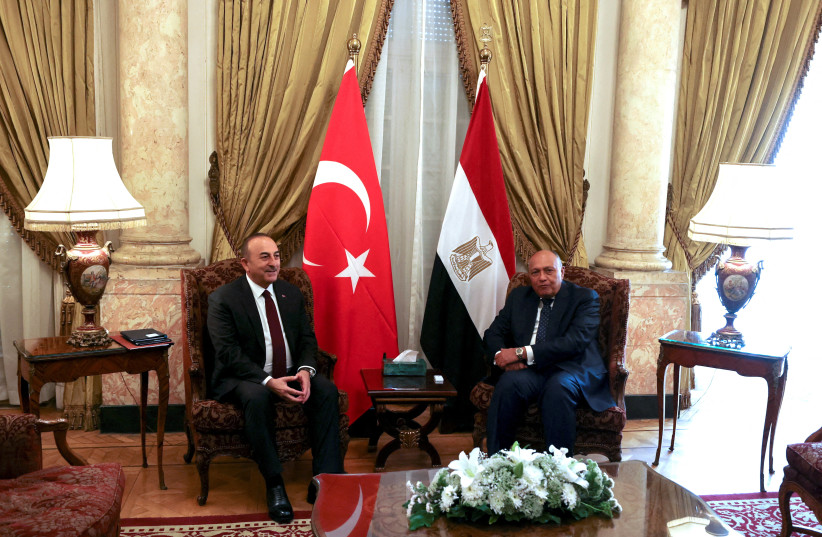  Turkish Foreign Minister Mevlut Cavusoglu meets with his Egyptian counterpart Sameh Shoukry in Cairo, Egypt March 18, 2023. (photo credit: REUTERS/MOHAMED ABD EL GHANY)