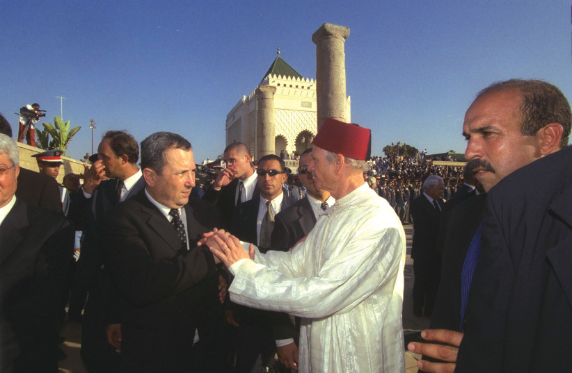  AT THE funeral of King Hassan II of Morocco, held in Rabat in 1999, prime minister Ehud Barak takes leave of the king’s adviser André Azoulay. (photo credit: Avi Ohayon/GPO)