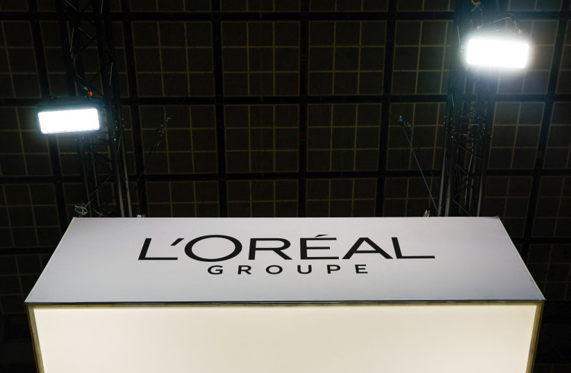The logo of French cosmetics group L'Oreal is seen at the Viva Technology conference dedicated to innovation and startups at Porte de Versailles exhibition center in Paris, France, June 14, 2023. (photo credit: GONZALO FUENTES / REUTERS)