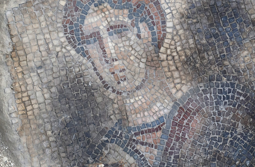  Dead philistine soldier, detail from the Samson carrying the gate of Gaza mosaic, Huqoq synagogue, June 2023.  (photo credit: JIM HABERMAN)