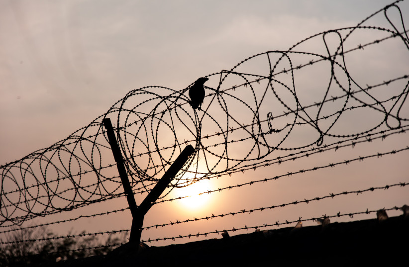  Illustrative image of a barbed wire fence. (photo credit: PATRICK HENDRY/UNSPLASH)