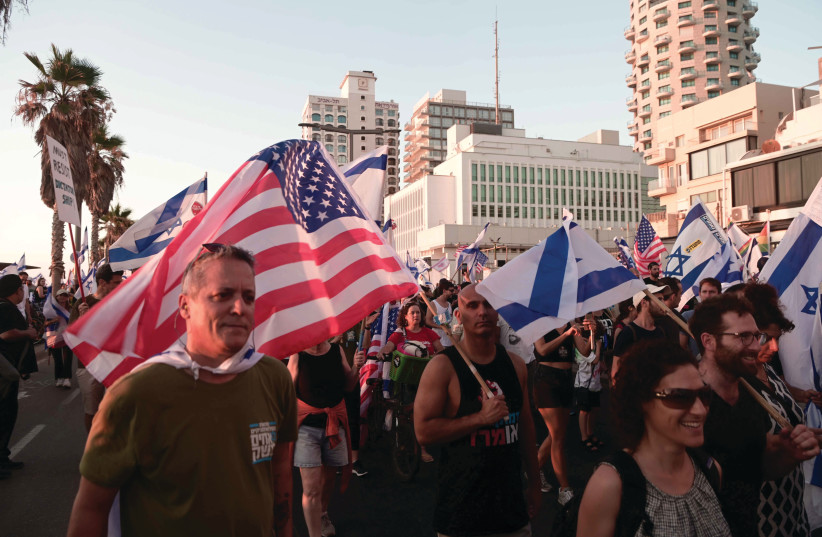  PROTESTERS MARCH past the US Embassy Branch Office in Tel Aviv on Tuesday during the ‘Day of Disruption’ against the judicial overhaul. (photo credit: AVSHALOM SASSONI)