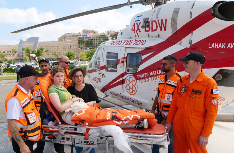  A young cancer patient named Raaya from the periphery is arriving at a hospital for treatment after being flown there by a United Hatzalah helicopter. (photo credit: UNITED HATZALAH‏)