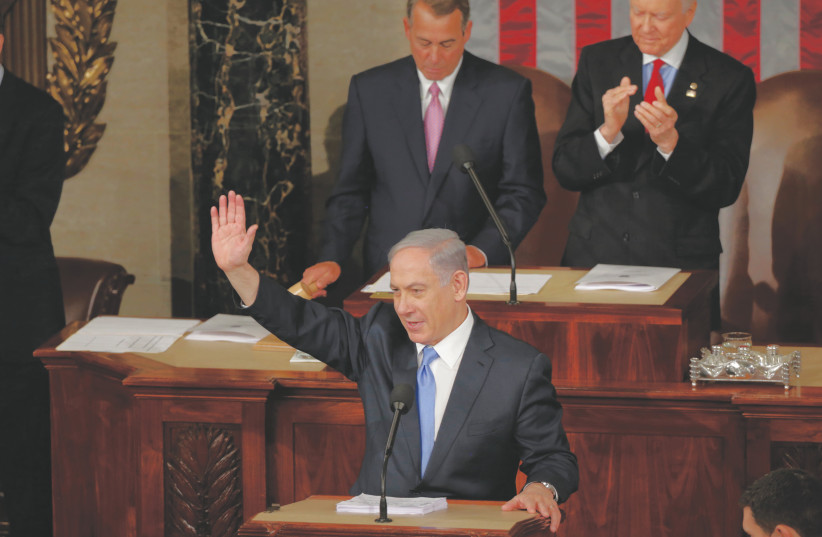  PRIME MINISTER Benjamin Netanyahu addresses a joint session of Congress, in 2015. ‘Mr. Herzog will not be speaking against the US president when he addresses Congress,’ said a Biden aide to the writer last week. (photo credit: GARY CAMERON/REUTERS)
