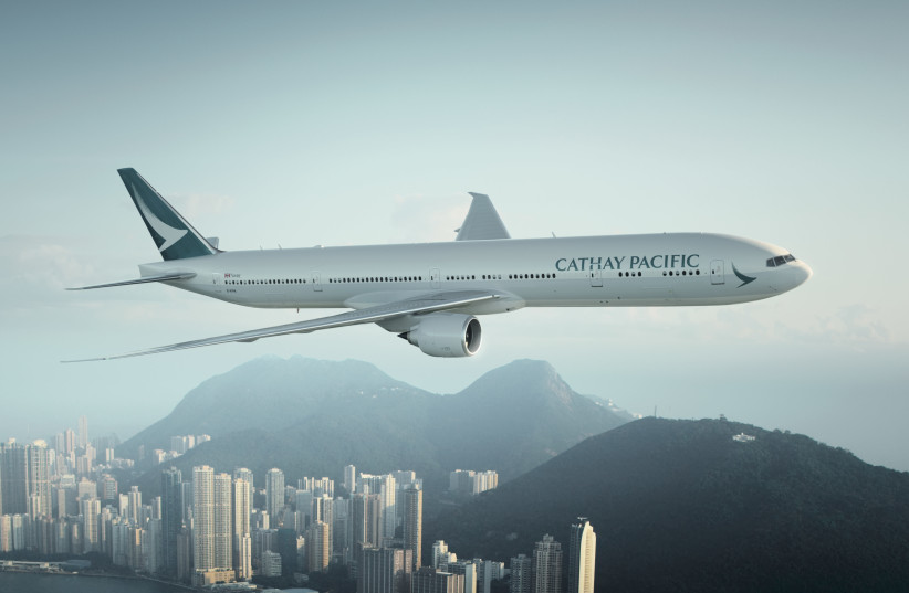  A Cathay Pacific jet flies over Hong Kong (photo credit: Courtesy)