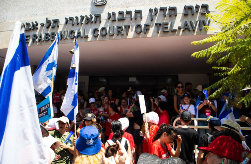 Anti-judicial reform protesters gather outside the rabbinical court in Tel Aviv July 18, 2023. (photo credit: I.H. Mintz)