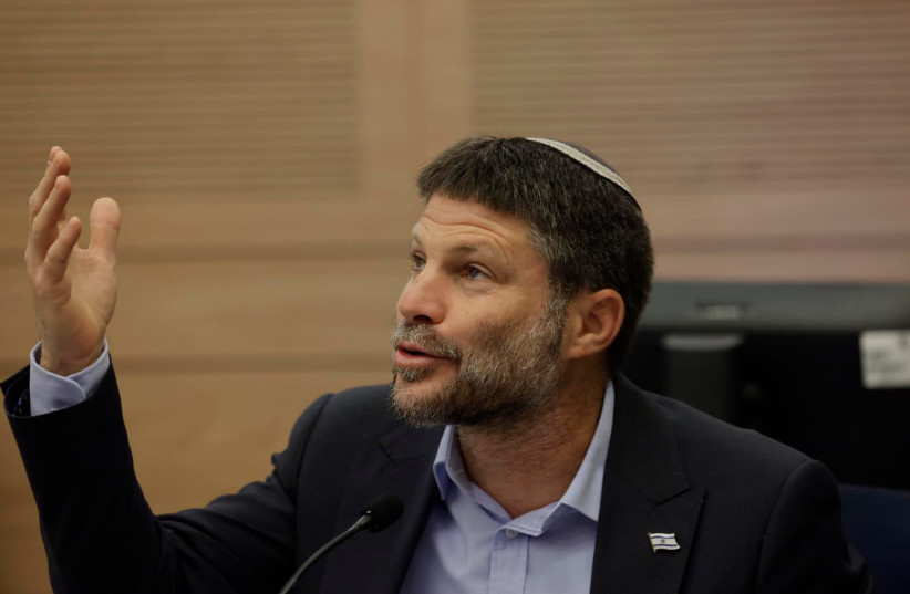  Israeli Finance Minister Bezalel Smotrich is seen at a meeting of the Knesset Foreign Affairs and Defense Committee, in Jerusalem, on July 19, 2023. (photo credit: MARC ISRAEL SELLEM/THE JERUSALEM POST)