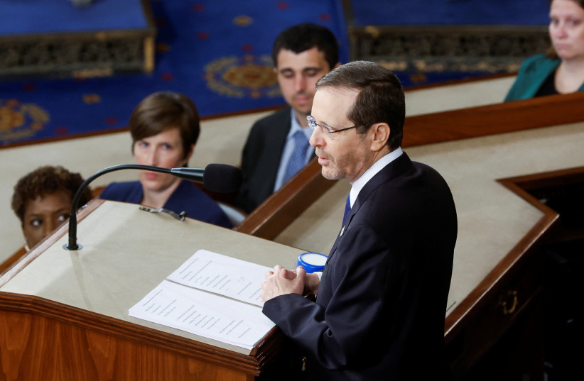 Israeli President Isaac Herzog addresses a joint meeting of Congress inside the House Chamber of the US Capitol in Washington, US, July 19, 2023. (photo credit: JONATHAN ERNST/REUTERS)