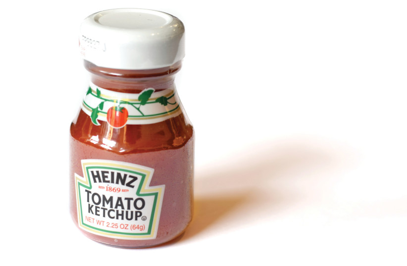  RIDICULOUS: HEINZ introduced ketchup in 1876, but the product’s labeling has been downgraded in Israel to ‘tomato seasoning’ by the SII.  (photo credit: Matt Popovich/Unsplash)